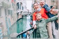 Madly happy family take a selfie photo on the one of bridge in Venice. Travel around the wolrd with kids concept image Royalty Free Stock Photo