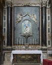 Madonna and Child by Andrea della Robbia in the Chapel of Del Ross in San Gaetano, Florence.