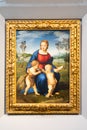 Madonna and Child with Young St John the Baptist - also named Madonna of the Goldfinch, 1506, by Raffaello Sanzio. Raphael - Royalty Free Stock Photo