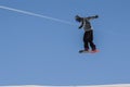 MADONNA DI CAMPIGLIO TN, ITALY, APRIL 9, 2017. Snowboarder enjoying jumps and runs