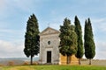 Madonna of Vitaleta chapel and cypress trees in tuscan countryside landscape, Val D`Orcia, Tuscany, Italy Royalty Free Stock Photo