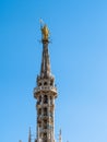 Madonnina golden statue on top of Milan Cathedral Royalty Free Stock Photo