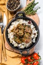 Madras beef with basmati rice, Indian food. White background. Top view