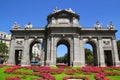 Madrid Puerta de Alcala with flower gardens