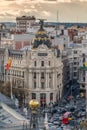 Madrid skyline sunset view, Metropolis, Banco de Espana Central Bank buildings and Gran Via and Alcala street junction. Royalty Free Stock Photo