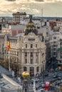 Madrid skyline sunset view, Metropolis, Banco de Espana Central Bank buildings and Gran Via and Alcala street junction. Royalty Free Stock Photo