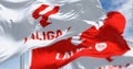 Three flags with La Liga logo waving in the wind Royalty Free Stock Photo