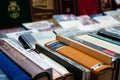 Bookshelf with old books at the book fair in Cuesta de Moyano in Madrid