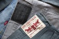 MADRID, SPAIN - APRIL 3, 2022: Close up of the back of various Levi`s jeans. Detail of different labels with the logo of the worl