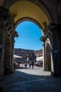 MADRID, SPAIN - ARRIL 12, 2019: Felipe III statue and Casa de la Panaderia on Plaza Mayor in Madrid - a central square in the city Royalty Free Stock Photo