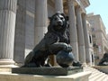 Cast iron lion on the entrance stairs to the Congress of Deputies. Madrid