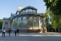Madrid / Spain - 02 August 2019: Crystal Palace in the Famous Retiro park in Madrid, in the sunset. Spanish public art museum with