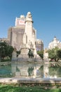 Madrid, Spain - August 8, 2018 view of the Miguel Cervantes Monument, in the background of the Edificio de Espana skyscraper Royalty Free Stock Photo
