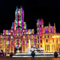 Cybele Palace at the Plaza de Cibeles with light trails of the traffic at night, Madrid, Spain Royalty Free Stock Photo