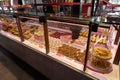 MADRID SPAIN - DECEMBRE 05, 2023: Assorted desserts in a showcase at the Sant Miguel market.