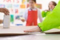Madrid, Spain, february 7, 2020: Close-up of a children in art therapy class drawing, painting and practicing engraving art. Child