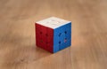 Madrid, Spain; 06 february 2019: Rubik Cube puzzle intelligence toy game solved, three sides Royalty Free Stock Photo
