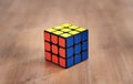 Madrid, Spain; 06 february 2019: Rubik Cube puzzle intelligence toy game solved, three sides Royalty Free Stock Photo