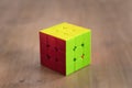 Madrid, Spain; 06 february 2019: Rubik Cube puzzle intelligence toy game solved, three sides Royalty Free Stock Photo