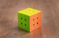 Madrid, Spain; 06 february 2019: Rubik Cube puzzle intelligence toy game solved, three sides Royalty Free Stock Photo