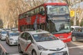 Madrid, Spain - 13 February 2020: Tourist bus `Madrid City Tour` rides on Calle Mayo