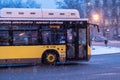 Madrid  Spain - January 2021: airport bus line under heavy snow due to Filomena Storm in Puerta de Alcala Royalty Free Stock Photo