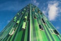 Detail of the facade of a green modern residential building in Vallecas district, in Madrid, Spain.
