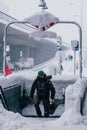 Madrid Spain - January 2021: Pacifico Underground Metro station covered in snow due to Filomena Storm with a soldier of Unidad