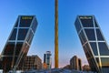 Gate of Europe KIO Towers and Obelisk of Calatrava at Paseo de la Castellana street in City of Madrid, Spain Royalty Free Stock Photo