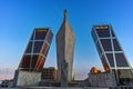 Gate of Europe KIO Towers and Obelisk of Calatrava at Paseo de la Castellana street in City of Madrid, Spain Royalty Free Stock Photo