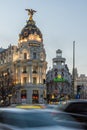 Sunset view of Gran Via and Metropolis Building Edificio Metropolis in City of Madrid, Spain Royalty Free Stock Photo
