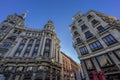 Wide angle street level view of Plaza Canalejas. Edificio Meneses, Casa de Allende buildings and