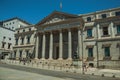 People in front the facade of Palacio de las Cortes in Madrid