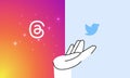 Madrid, Spain - July, 2023: Threads VS Twitter app icons face to face on user hand. Application, microblogging social network. Royalty Free Stock Photo