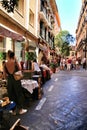 Antique stalls in the streets of The letters district in Madrid