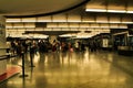 Passengers walking through Atocha train station in Madrid