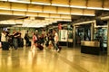 Passengers walking through Atocha train station in Madrid