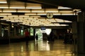 Passengers walking through Atocha train station in Madrid