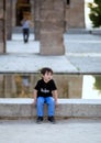 2017.05.31, Madrid, Spain. A little boy on background of The current Temple of Debod in Madrid. Sightseeing of Spain.