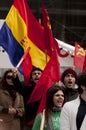 Communist demonstrators waving flags and chanting