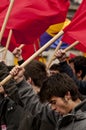 Communist demonstrators waving flags and chanting