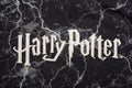 MADRID, SPAIN - MARCH 30, 2021: Harry Potter white logo on black storm background