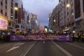 Head of the feminist march and group of protesters concentrated with a protest banner in one of the main streets of central Madrid