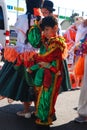 Madrid, Spain, March 2nd 2019: Carnival parade, boy from Bolivian dance group dancers with traditional costume after the