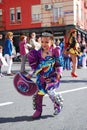 Madrid, Spain, March 2nd 2019: Carnival parade, Girl from Bolivian dance team dancing with typical costume