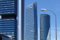 Four modern skyscrapers in the Cuatro Torres Business Area. Crystal, Space, Pwc and CEPSA Towers in Madrid, Spain