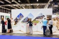Madrid, Spain - May 20, 2021: Promotional stand of the cities of Burgos Fitur 2021, visited by several people