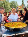 Spanish Paella in progress at a gastronomic fair.