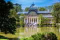 View of the beautiful Palacio de Cristal a conservatory located in El Retiro Park built in 1887 in