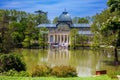 View of the beautiful Palacio de Cristal a conservatory located in El Retiro Park built in 1887 in